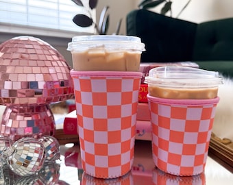 Checkered Orange Iced Coffee Sleeve: Trendy Cup Accessory
