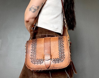 1970s tooled leather satchel bag.