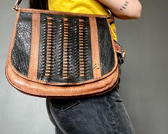 1970s two toned black & brown leather satchel bag.