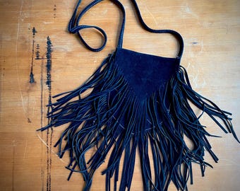 1970s black fringed western suede shoulder bag.