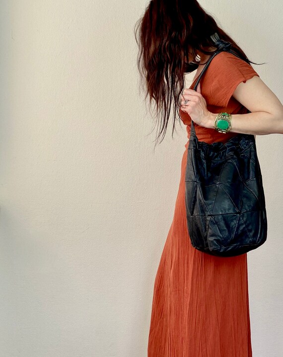 1980s black soft leather patchwork bucket bag.