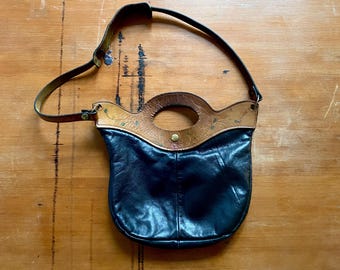 1970s Two toned leather satchel bag.