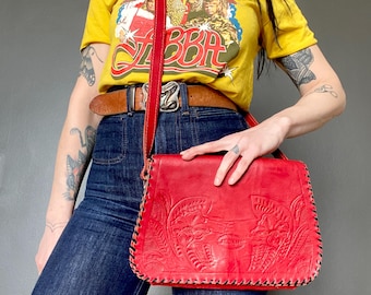 1970s Red tooled leather satchel bag.