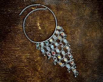 1970s collar bib necklace with gemstone inserts.