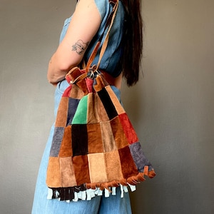 1970s Multi color suede patchwork drawstring bag