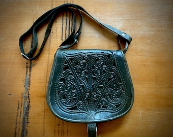 SOLD!!! Don’t buy!! 1970s tooled cut work black leather satchel bag.