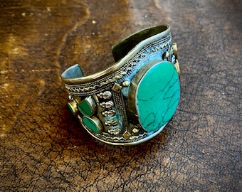 1970s handmade bracelet cuff with green stone inserts