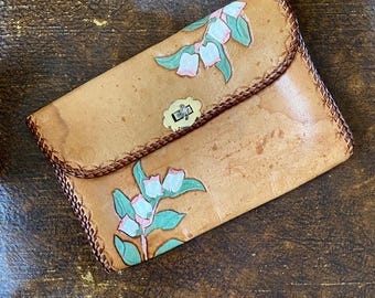 1970s handmade painted and tooled leather clutch.