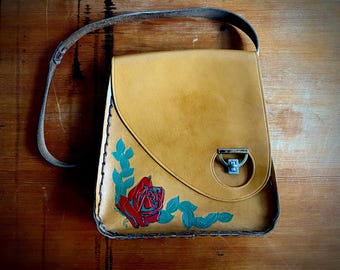 1970s tooled painted leather satchel bag.