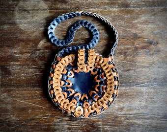 1970s braided black leather bag.