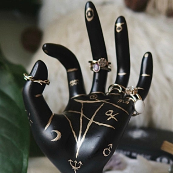 Soporte de anillo de mano de quiromancia Simbolos negros y dorados Estrellas Astrologia celestial Altar magico Soporte de arbol de anillo de bruja de lamina de oro Etsy Mexico