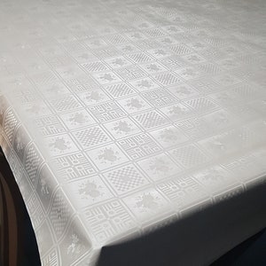 140 cm wide plain white oilcloth.