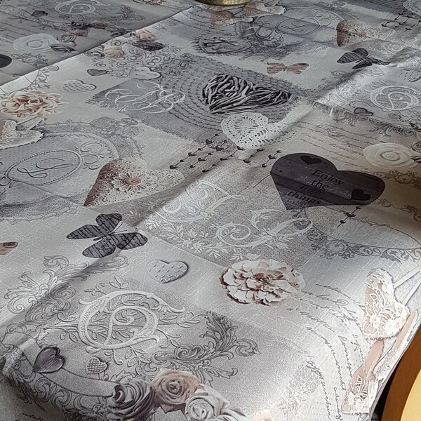 Nappe ovale en polyester  240x145cm beige et grise.