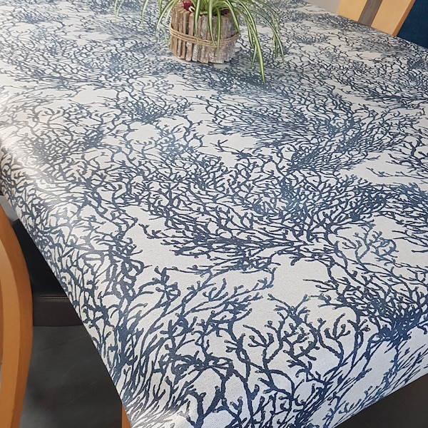 Toile enduite corail bleu marine en 1.50 m de large.