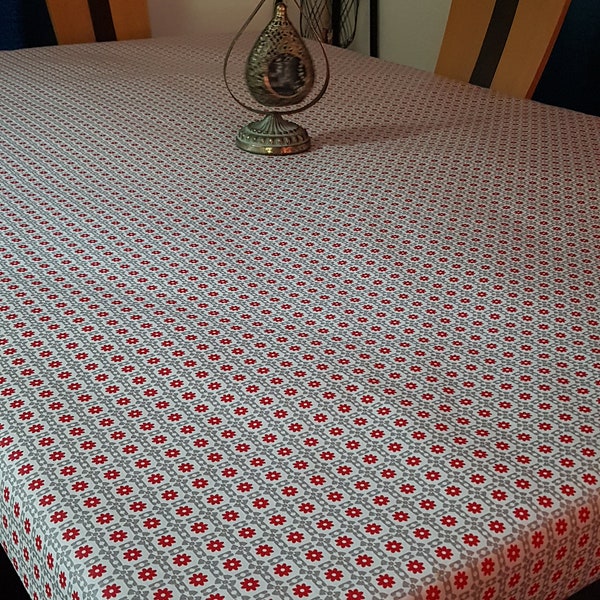 Toile en coton enduit en 1.55m de large rouge et grise.