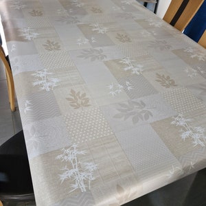 Oilcloth tablecloth 1.40 meters wide beige.