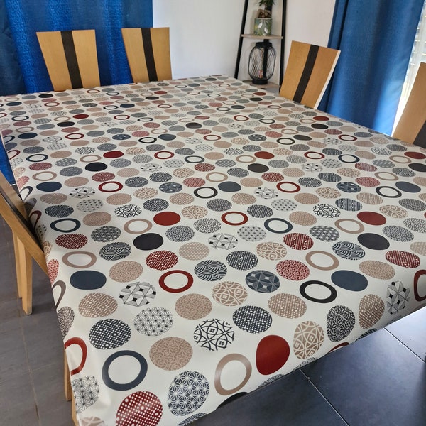 Toile cirée 140 cm de large "Les cercles rouges et gris".