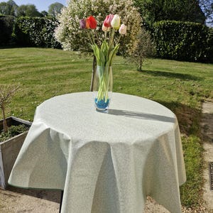 Round oilcloth 155cm wide green.