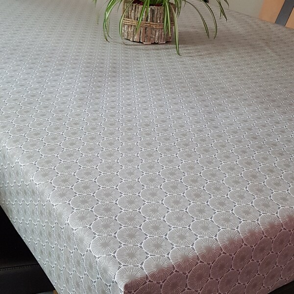 Toile en coton enduit en 1.55m de large beige.