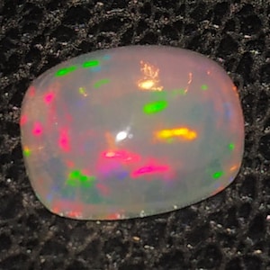 Ethopian opal 1.30cts6x8x4 morvolos100%Natural Ethopian opal A+Quality welo Ethopian opal wholesale opal welo Opal Amazing smooth fire Opal,