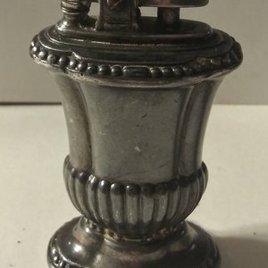 Ronson Mayfair trade mark, silver plated vintage table top classic flint and fluid candle lighter.
