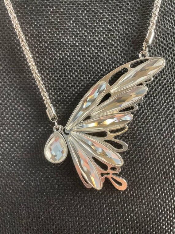 Silvertone mesh chain with butterfly pendant. - image 2