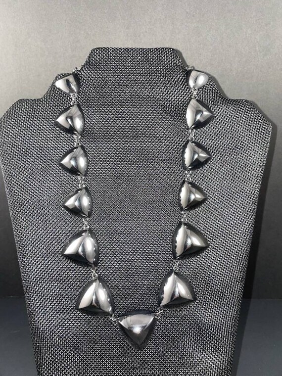 Vera Wang faceted triangle pendants linked togeth… - image 1