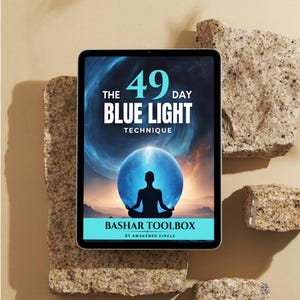 May include: A digital tablet displaying the cover of a book titled "The 49 Day Blue Light Technique" by Bashar Toolbox. The cover features a silhouette of a person meditating inside a blue orb against a colorful background.
