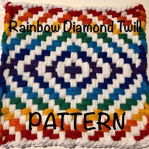 May include: A rainbow colored crochet pot holder with a white background and the text "Rainbow Diamond Twill PATTERN" in black.