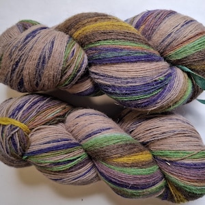 Wool yarn for knitting. High quality multicolor  green , blue, grey striped 100% wool yarn. Natural lanolin yarn.