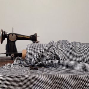 black with white houndstooth pattern linen fabric texture, natural woven linen material for curtains and clothing, 145 cm wide (57 inches), OEKO-TEX Standard 100 certified, medium weight, sold by length from 0.5 m or 0.5 yard