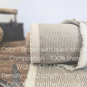 May include: A roll of brown linen fabric with vertical black stripes. The fabric is 57 inches wide and made of 100% linen. The image also shows a ball of twine, scissors, and an iron.