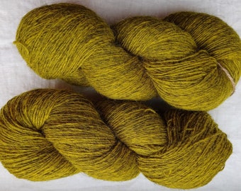 Wool yarn for knitting. High quality moss green hand dyed 100 % merino wool yarn. Natural lanolin yarn.