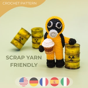 May include: A crocheted figure in a yellow hazmat suit with a black mask and gloves, holding a crocheted ice cream cone. Yellow barrels with radiation symbols are in the background. The text "CROCHET PATTERN" and "SCRAP YARN FRIENDLY" are visible.