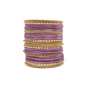Lila skimrande armbandsset