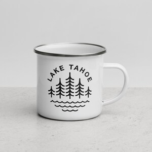 May include: White enamel camping mug with a black graphic of pine trees and the text "LAKE TAHOE" in a circle.