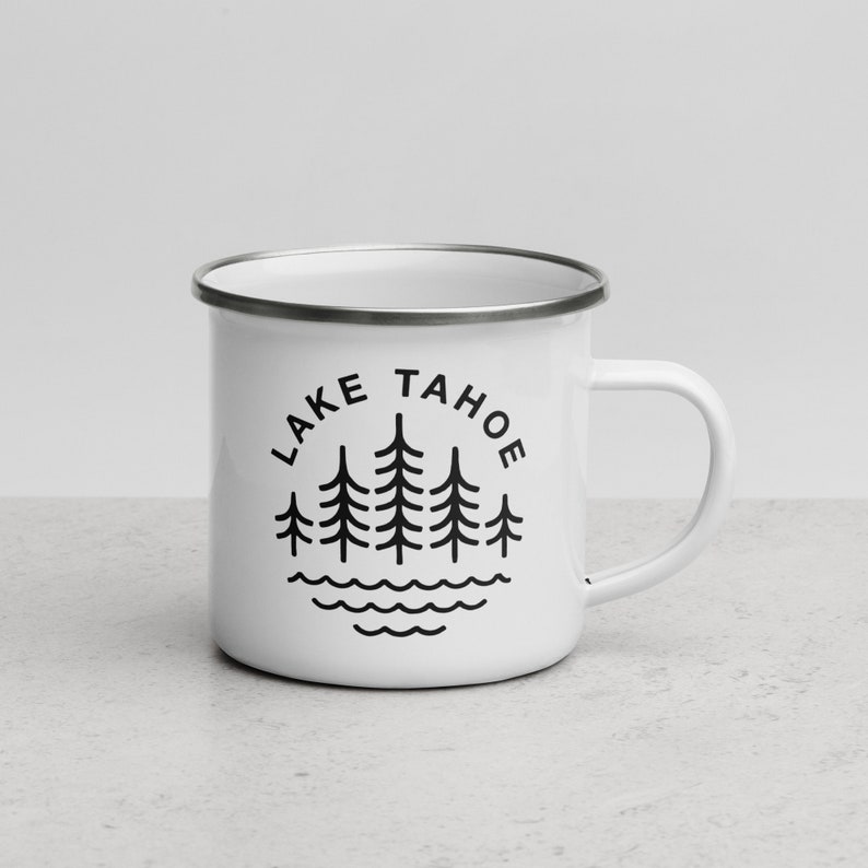 May include: White enamel camping mug with a black graphic of pine trees and the text "LAKE TAHOE" in a circle.