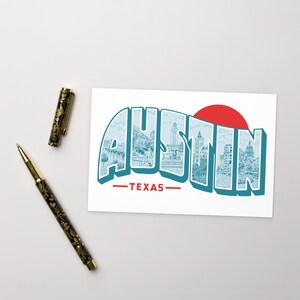 May include: A vintage-style postcard with a blue and white illustration of the Austin, Texas skyline. The text "Austin - Texas" is in red letters.
