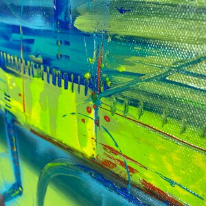 May include: Abstract painting featuring vibrant colours, including green, blue, yellow, and red. The paint is applied in thick strokes, creating a textured surface.