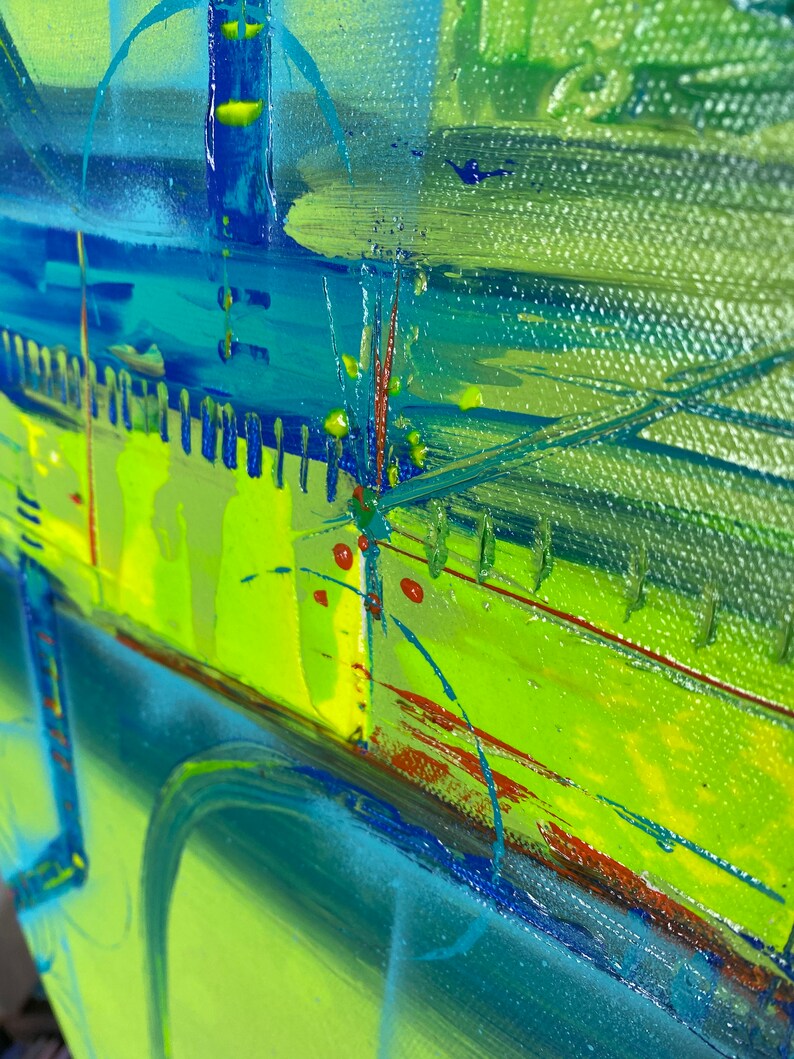 May include: Abstract painting featuring vibrant colours, including green, blue, yellow, and red. The paint is applied in thick strokes, creating a textured surface.