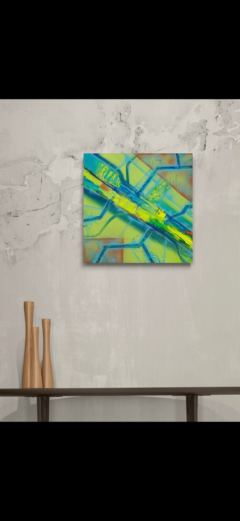 May include: Abstract painting with a yellow, green, and blue colour scheme. The painting features a series of intersecting lines and shapes, creating a dynamic and energetic composition.