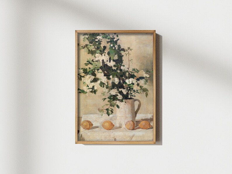Vintage flowers and lemons art print reproduction featuring a classic floral citrus still life composition. The artwork shows delicate flowers paired with bright lemons in a timeless arrangement, rendered in soft natural tones with traditional painterly detail. This vintage still life wall art is ideal for kitchen decor, dining rooms, and elegant homes inspired by European, Mediterranean, or classic farmhouse style.