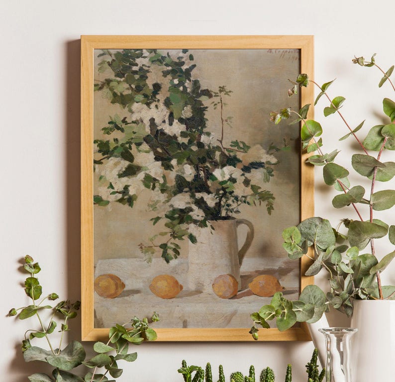 Vintage flowers and lemons art print reproduction featuring a classic floral citrus still life composition. The artwork shows delicate flowers paired with bright lemons in a timeless arrangement, rendered in soft natural tones with traditional painterly detail. This vintage still life wall art is ideal for kitchen decor, dining rooms, and elegant homes inspired by European, Mediterranean, or classic farmhouse style.