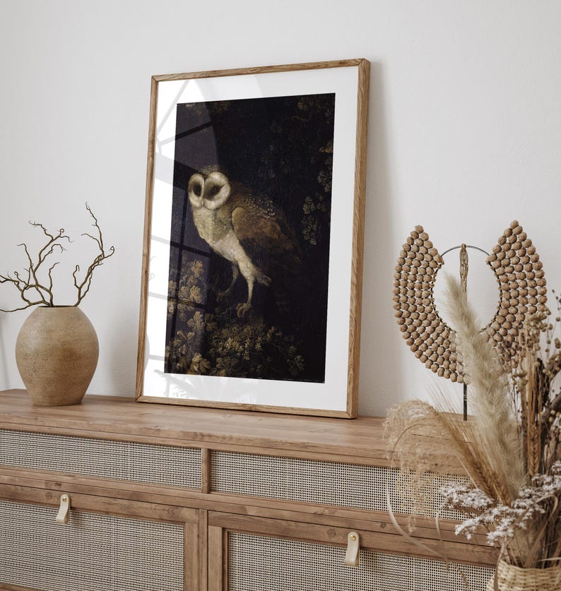 Antique Owl Painting featuring a moody, rustic bird print in a dark academia style. This vintage animal wall art showcases a detailed owl portrait, perfect for creating a scholarly, atmospheric vibe. Ideal as vintage owl print decor, owl wall art, or bird print for a study, library, or cozy reading nook. Printed wall art.