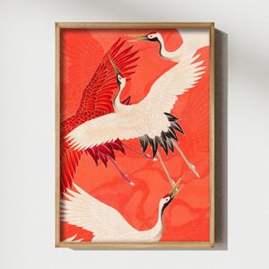 Red and white Japanese cranes in flight illustrated in a traditional Asian art style on a vibrant red background. Framed or unframed wall art.