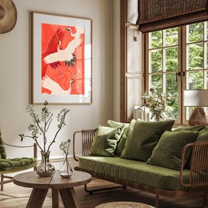 Red and white Japanese cranes in flight illustrated in a traditional Asian art style on a vibrant red background. Framed or unframed wall art.