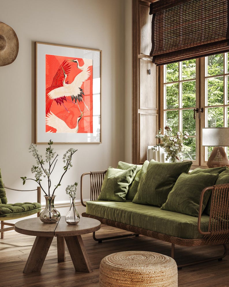 Red and white Japanese cranes in flight illustrated in a traditional Asian art style on a vibrant red background. Framed or unframed wall art.