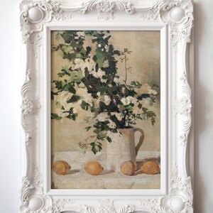Floral and lemon still life wall art print displayed as vintage home decor. This reproduction features flowers and lemons arranged in a balanced classic composition with warm tones and refined detail, making it perfect for kitchens, breakfast nooks, gallery walls, or traditional interiors seeking timeless botanical artwork.