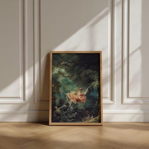 Fragonard The Swing L'Escarpolette 1767 Rococo painting giclée print, natural oak wood float frame, leaning against white moulded Haussmann wall herringbone parquet floor, French country chateaucore romantic wall art