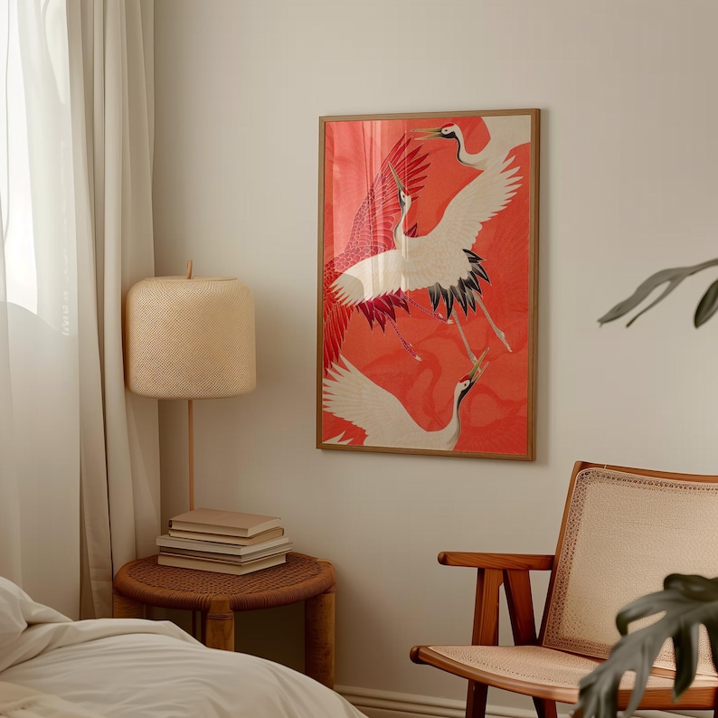 Red and white Japanese cranes in flight illustrated in a traditional Asian art style on a vibrant red background. Framed or unframed wall art.